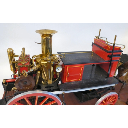 201 - A scratch built scale model, replica of a late 19thC two horse drawn fire engine with 'Metropolitan'... 