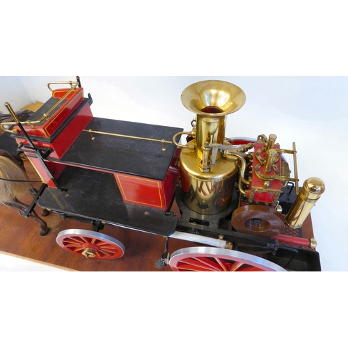 201 - A scratch built scale model, replica of a late 19thC two horse drawn fire engine with 'Metropolitan'... 