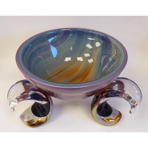 211 - A Murano glass bowl of basin design, elevated on three outset, C-scrolled feet, decorated in colours... 