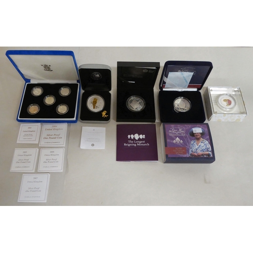 238 - Three Britannia collection silver proof coin sets, 2001, 2005 and 2003