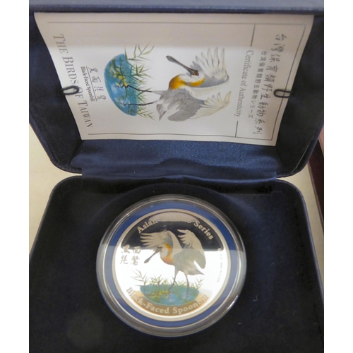 240 - Silver proof collector's coins: to include two from the Asian Wildlife series