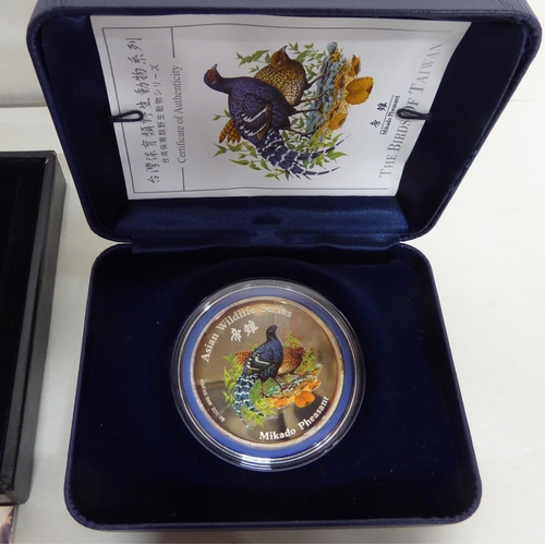 240 - Silver proof collector's coins: to include two from the Asian Wildlife series