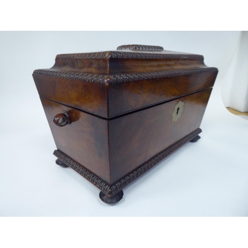 25 - A William IV figured mahogany tea casket of sarcophagus form with bead and reel carved borders, on b... 