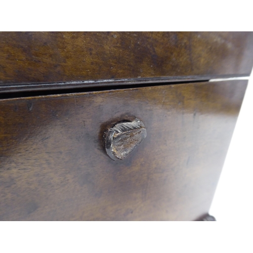 25 - A William IV figured mahogany tea casket of sarcophagus form with bead and reel carved borders, on b... 