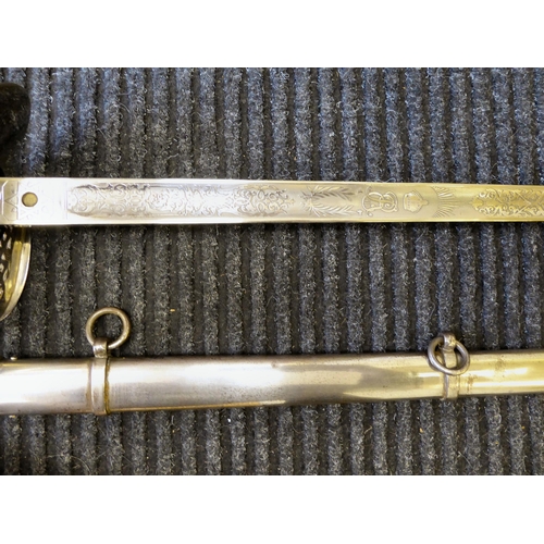 252 - An Edwardian VII dress sword with a pierced and silvered guard and a wire bound hide handgrip, the e... 