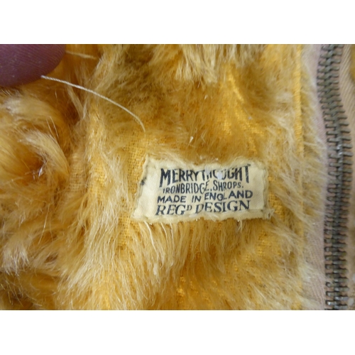 26 - A Merrythought plush mohair covered pyjama case; an unmarked fox wearing hunting pink  16