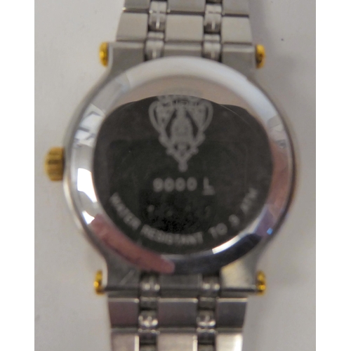 268 - A lady's Gucci bi-coloured stainless steel wristwatch, on a flexible strap, the quartz movement face... 