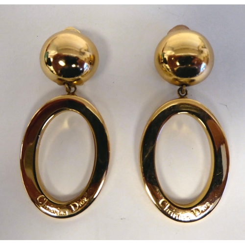 274 - A pair of Christian Dior clip-on yellow metal, pendant earrings