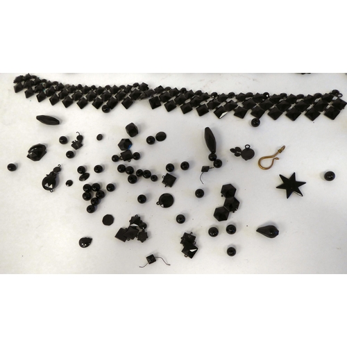 283 - Jet jewellery and various other black beads: to include brooches and buckles