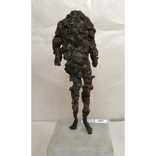 289 - A bronze abstract sculpture, a standing figure, on a marble plinth  17