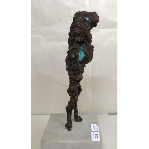 289 - A bronze abstract sculpture, a standing figure, on a marble plinth  17