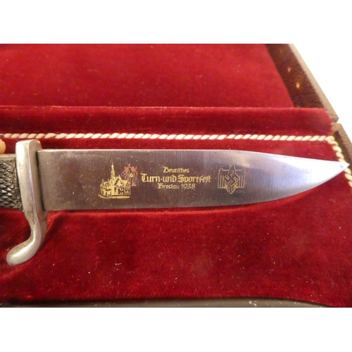 29 - A German Nazi presentation Hitler Youth knife with an emblem on the handle, the Horster blade 4.5