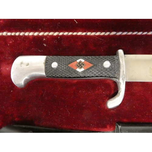 29 - A German Nazi presentation Hitler Youth knife with an emblem on the handle, the Horster blade 4.5