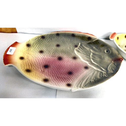 297 - An Italian earthenware fish service, each piece fashioned as a fish  largest plate 17