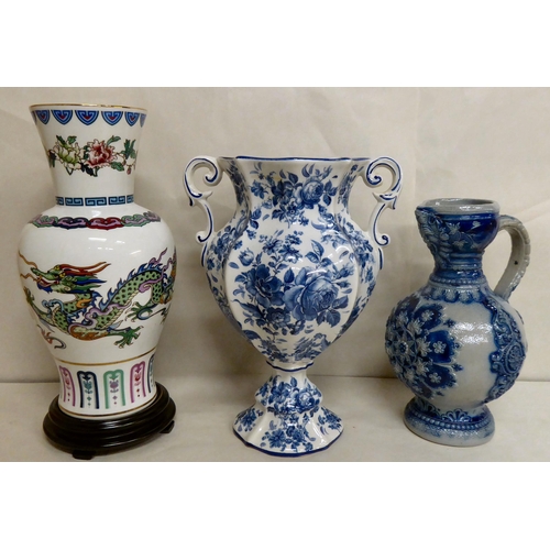 312 - Ceramics: to include a Quimper pottery dish of oval form, decorated with floral sprigs  12