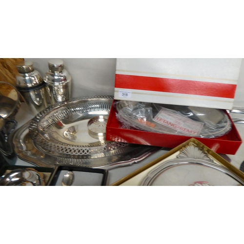 315 - Metalware: to include a Christofle silver plated serving platter with a cast wavy border  18