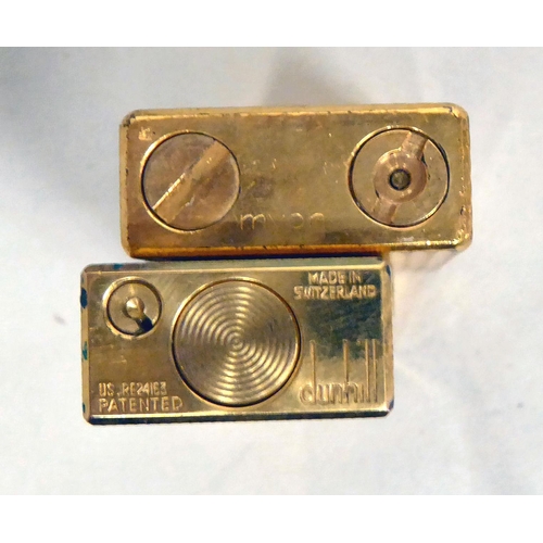 319 - Two gilt finished gas lighters, viz. a Dunhill; and a Myon