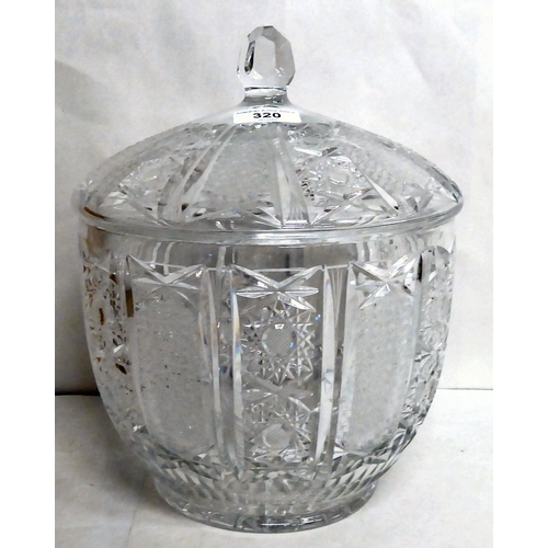 320 - A lead crystal punch bowl and cover with star cut panels  12