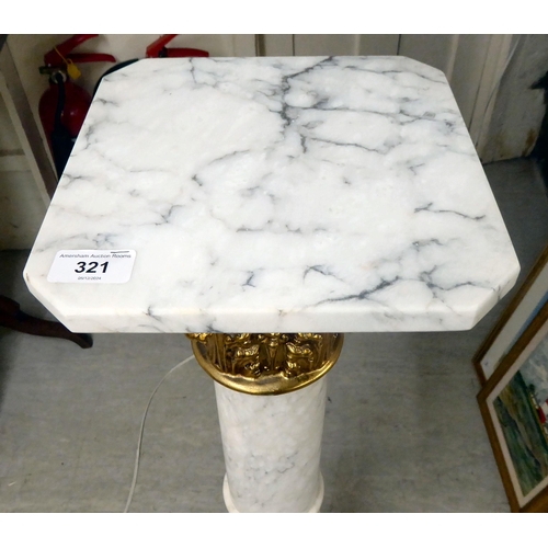 321 - A white and grey mottled marble column with a gilt composition Corinthian capital