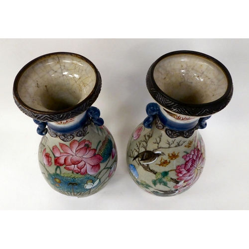 338 - A pair of 20thC Chinese porcelain vases of ovoid form, each with moulded flank handles, a narrow nec... 