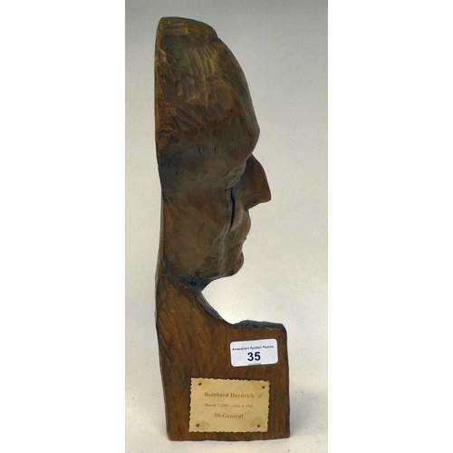 35 - A German carved wooden bust, the SS General Reinhard Heydrich, D June 4 1942  13