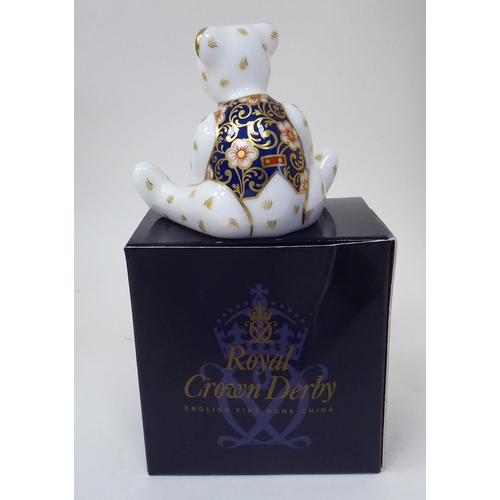 365 - The Royal Crown Derby Steiff dark blonde mohair Teddy bear with a mobile head and limbs, a stitched ... 