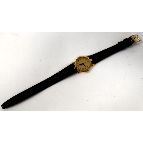 373 - A lady's Gucci yellow metal wristwatch, the quartz movement faced by a Roman dial, on a dedicated bl... 