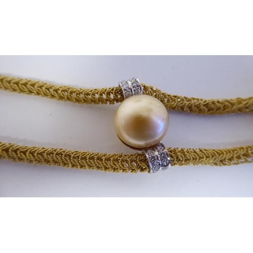 374 - An 18ct gold woven chain necklace, set with three large cultured pearls, in grey, cream and white, t... 