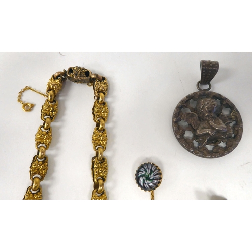 378 - Items of personal ornament: to include a yellow metal stickpin; and pendant cross