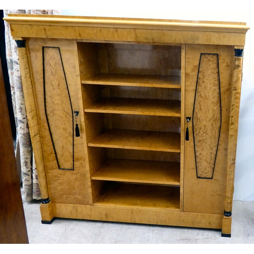 387 - A modern Egyptian Biedermeier style bleached and maple veneered breakfront bookcase with a shelved t... 