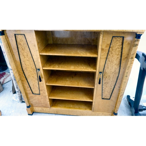 387 - A modern Egyptian Biedermeier style bleached and maple veneered breakfront bookcase with a shelved t... 