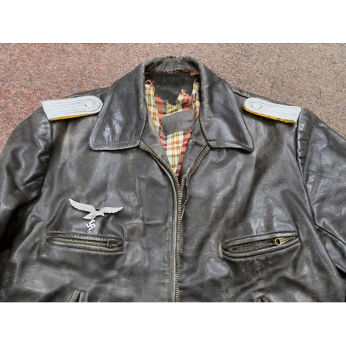 39 - A German Luftwaffe pilots black leather flight jacket with zip fasteners(Please Note: this lot is su... 