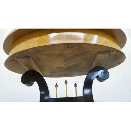 391 - A modern Egyptian Biedermeier style bleached, maple veneered and black lacquered, oval vanity table,... 