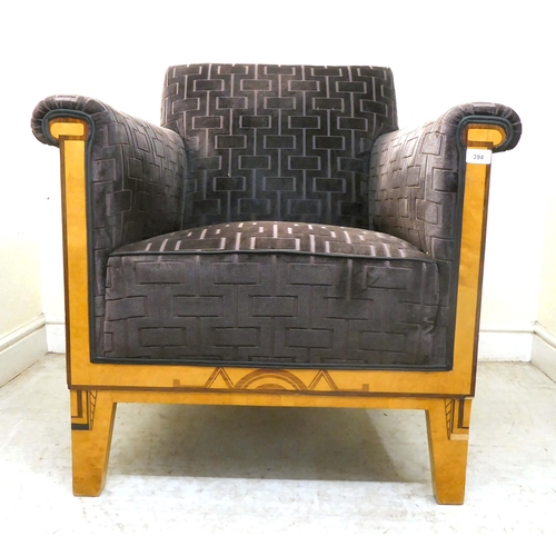 394 - A modern showwood maple veneered and inlaid Art Deco style club armchair with a low back and enclose... 