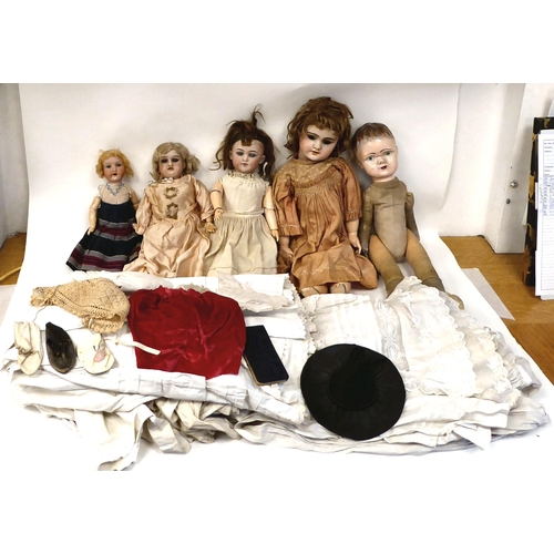 400 - Four various early 20thC French and German dressed dolls with ceramic heads and painted figures ... 