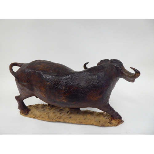 48 - A carved and stained hardwood model water buffalo  approx. 8