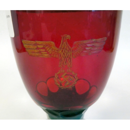 54 - A German Nazi red and green, ruby coloured and cut glass goblet  bearing an inscribed emblem(Pl... 