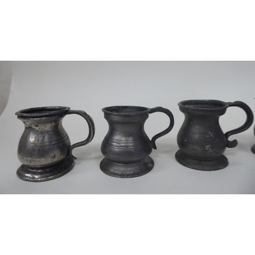 67 - Twelve similar 18th and 19thC pewter, baluster shape measures