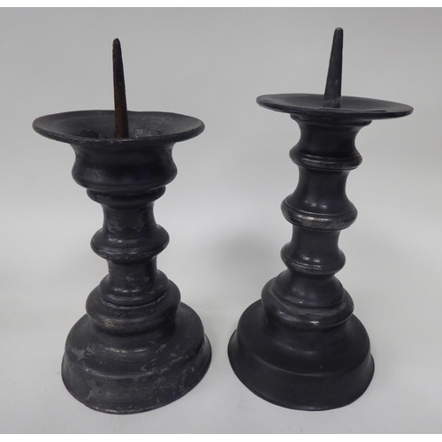 69 - Two similar late 19thC knopped, pricket style pewter candlesticks  8