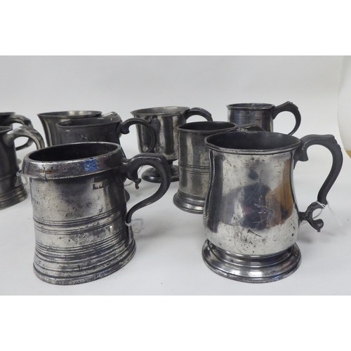 74 - Twelve various 18th/19thC pewter one pint (approx.) mugs of varying design