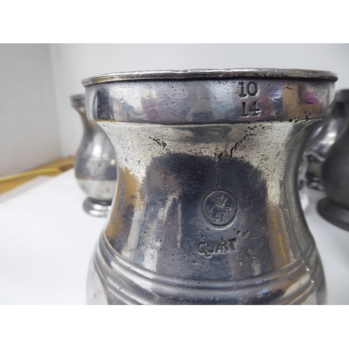 75 - Twelve similar 18th and 19thC pewter quart size (approx.) baluster shape mugs