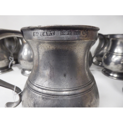 75 - Twelve similar 18th and 19thC pewter quart size (approx.) baluster shape mugs