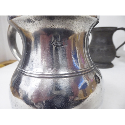 77 - Ten 17th and 18thC pewter mugs: to include quart size, pint and similar of varying designs