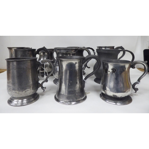 77 - Ten 17th and 18thC pewter mugs: to include quart size, pint and similar of varying designs