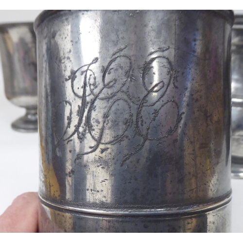 77 - Ten 17th and 18thC pewter mugs: to include quart size, pint and similar of varying designs