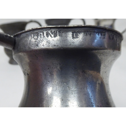 78 - Twelve similar 18th and 19thC pewter tankards/measures of waisted, baluster form