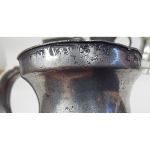 78 - Twelve similar 18th and 19thC pewter tankards/measures of waisted, baluster form