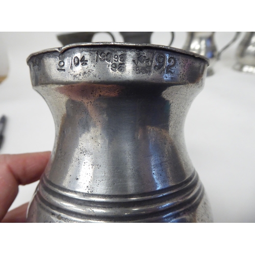 78 - Twelve similar 18th and 19thC pewter tankards/measures of waisted, baluster form