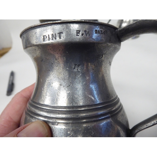 78 - Twelve similar 18th and 19thC pewter tankards/measures of waisted, baluster form