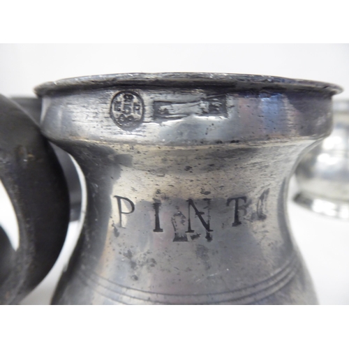 78 - Twelve similar 18th and 19thC pewter tankards/measures of waisted, baluster form